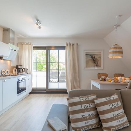 Ferienwohnungen Haus Am Strand ツィングシュト エクステリア 写真