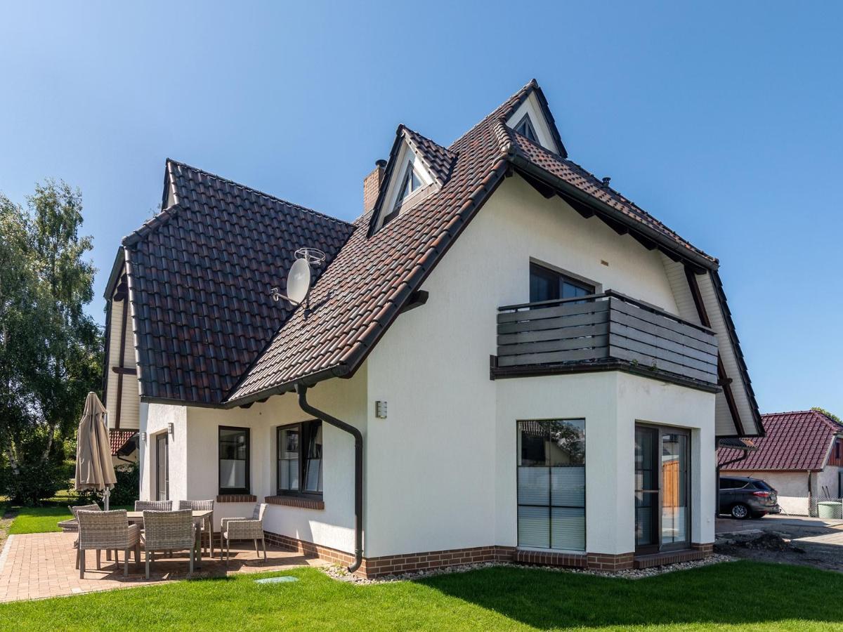 Ferienwohnungen Haus Am Strand ツィングシュト エクステリア 写真