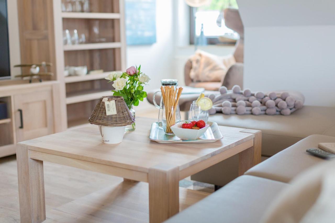 Ferienwohnungen Haus Am Strand ツィングシュト エクステリア 写真