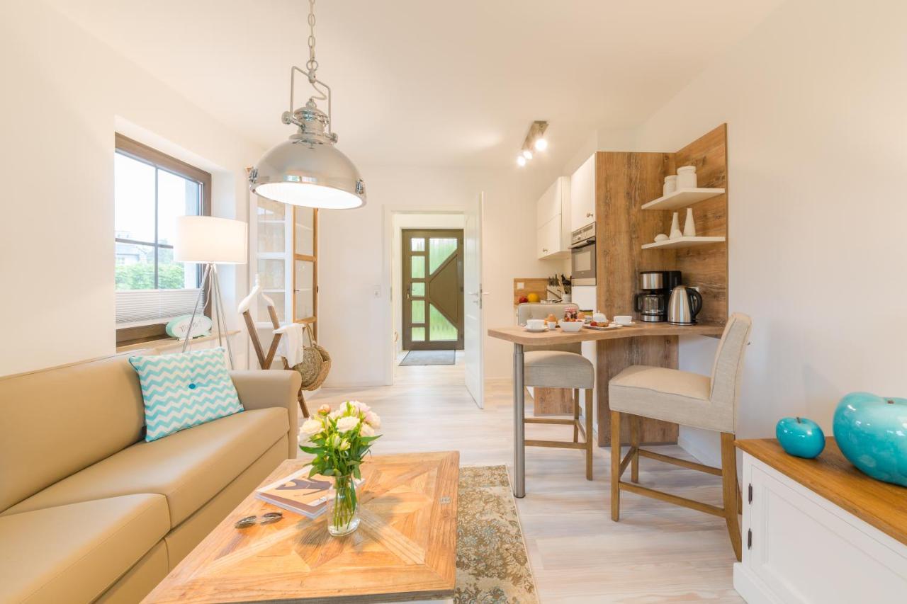 Ferienwohnungen Haus Am Strand ツィングシュト エクステリア 写真