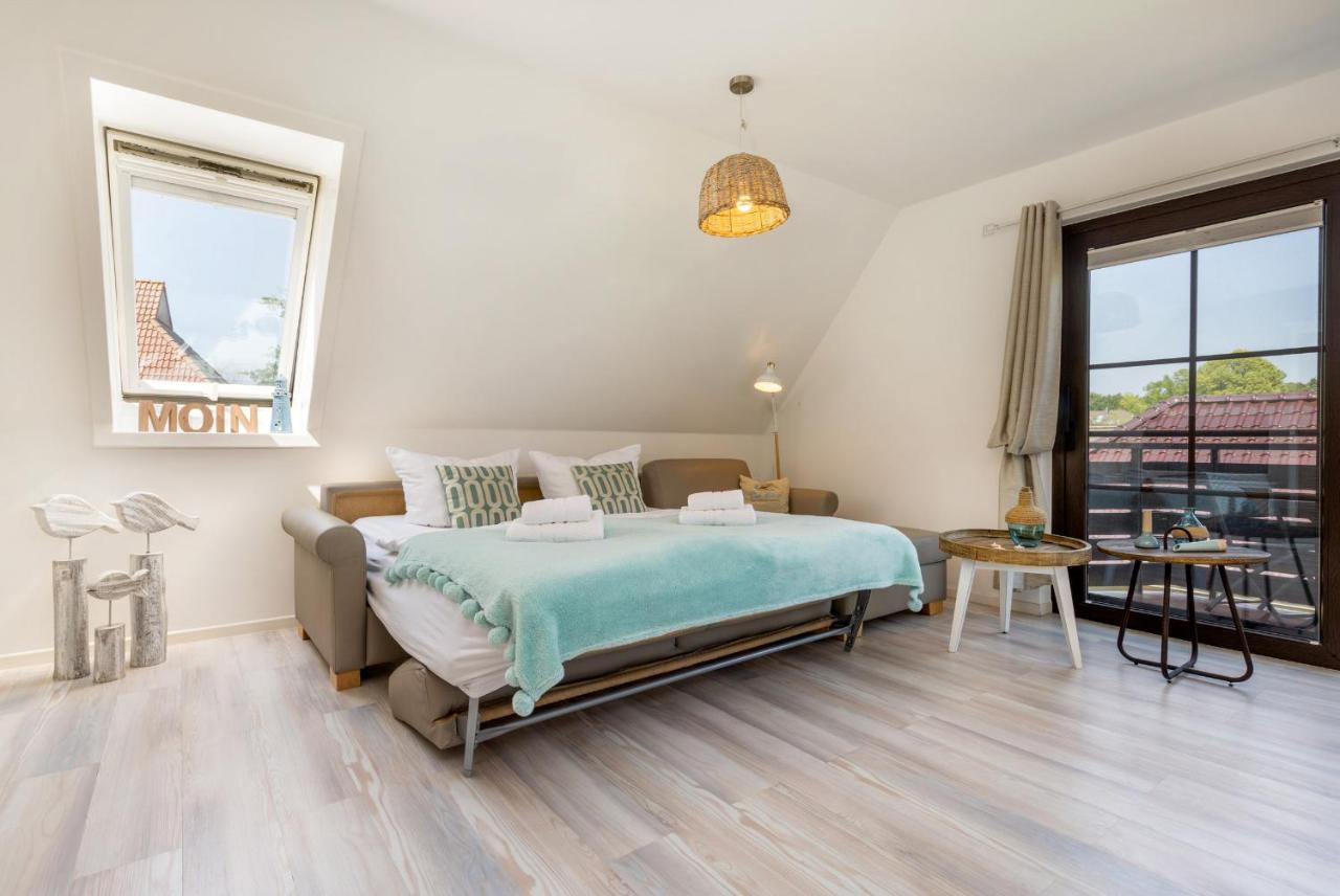 Ferienwohnungen Haus Am Strand ツィングシュト エクステリア 写真