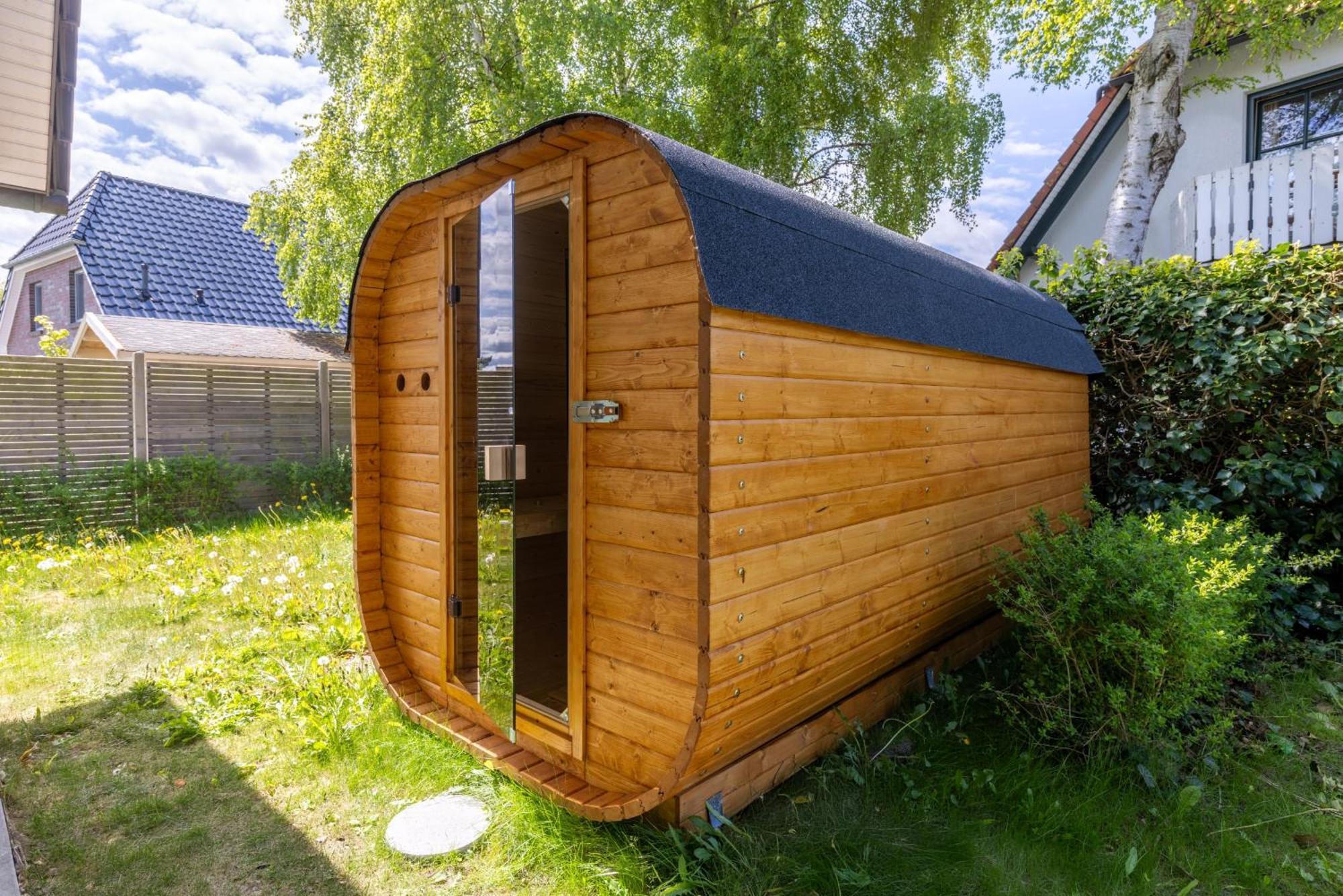 Ferienwohnungen Haus Am Strand ツィングシュト エクステリア 写真